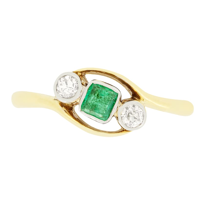 Edwardian 0.20ct Emerald and Diamond Three Stone Twist Ring, c.1910s